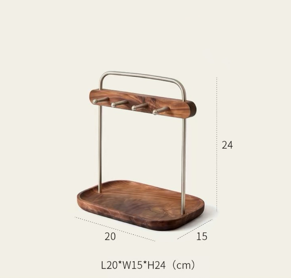 A wooden and metal hanging organizer tray with a rectangular wood base, four small hanging hooks on a horizontal wood bar, and a top handle, shown with dimension labels 20, 15, and 24 on a light beige background.