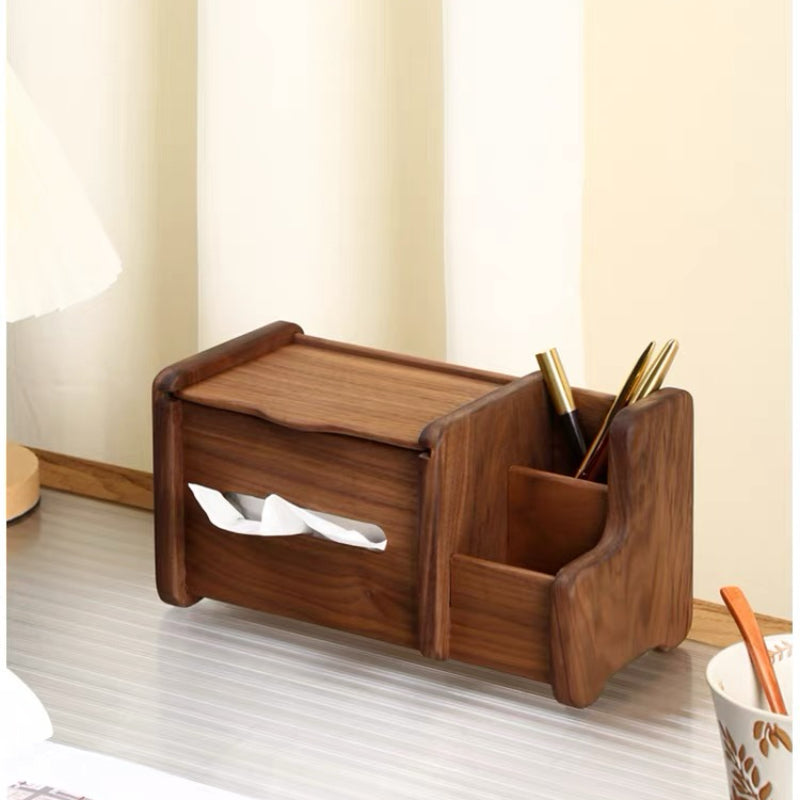 A dark brown wooden desk organizer with a tissue dispenser and pen holder, shown on a tabletop in a home office setting.