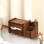 A dark brown wooden desk organizer with a tissue dispenser and pen holder, shown on a tabletop in a home office setting.