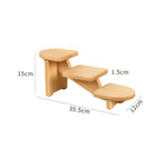 A small wooden step stool or pet step shown on a white background.