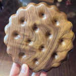 Biscuit shaped wooden trivet made from natural solid wood