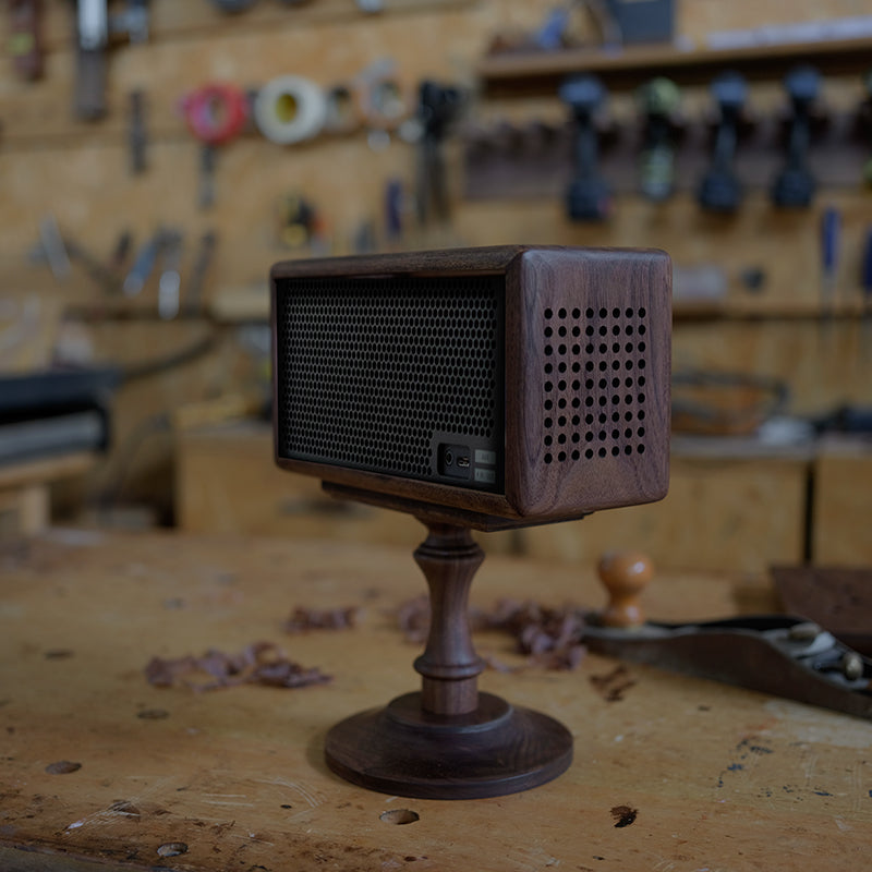 Center stage wooden speaker stand made from natural walnut wood