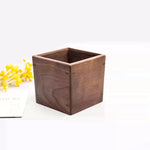 Compact solid walnut desktop bin with minimalist design
