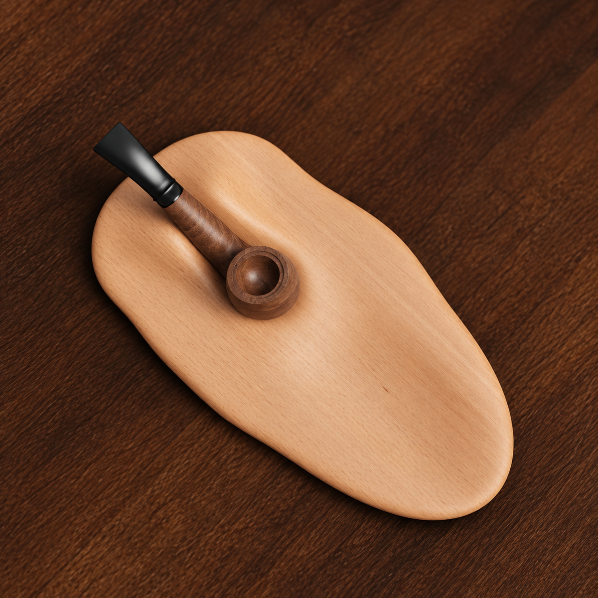 A light natural wood smoking tray with a carved wooden bowl and black mouthpiece, placed on a dark brown wood surface.