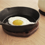 Cutout wooden trivet made from natural walnut wood