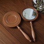 Elegant walnut beauty mirror for daily grooming routine