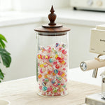 Glass canister with solid walnut lid and elegant design