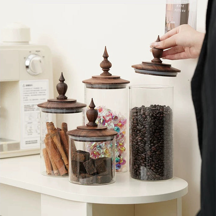 Glass canister with solid walnut lid and minimalist design