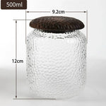 Glass coffee storage canisters with solid walnut covers