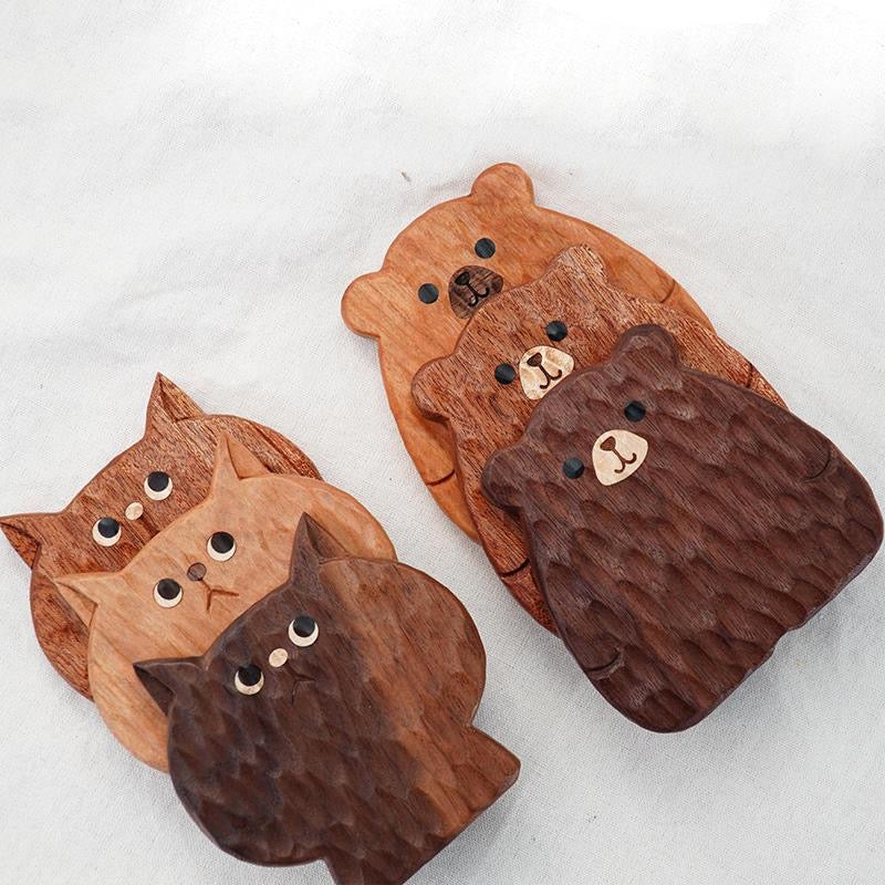 Handcrafted solid walnut coaster set with paw design
