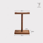 Natural wood headphone stand with smooth walnut grain finish