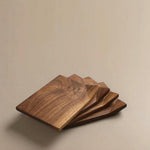 Little Roll walnut coaster set made from natural wood