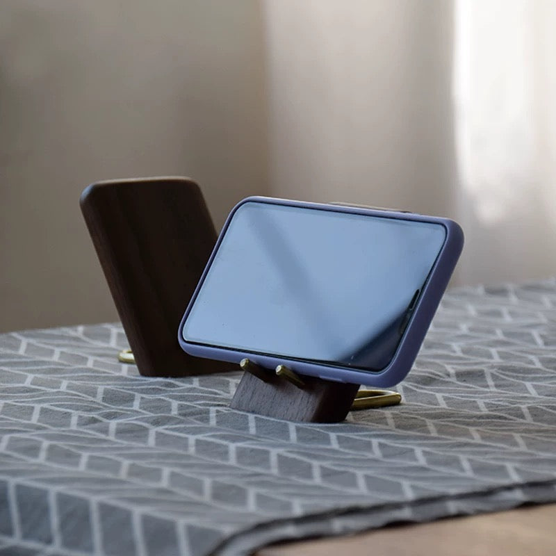 Minimalist walnut phone stand with comfortable viewing angle