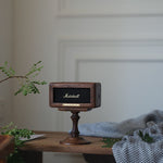 Minimalist walnut speaker base for desktop audio setup