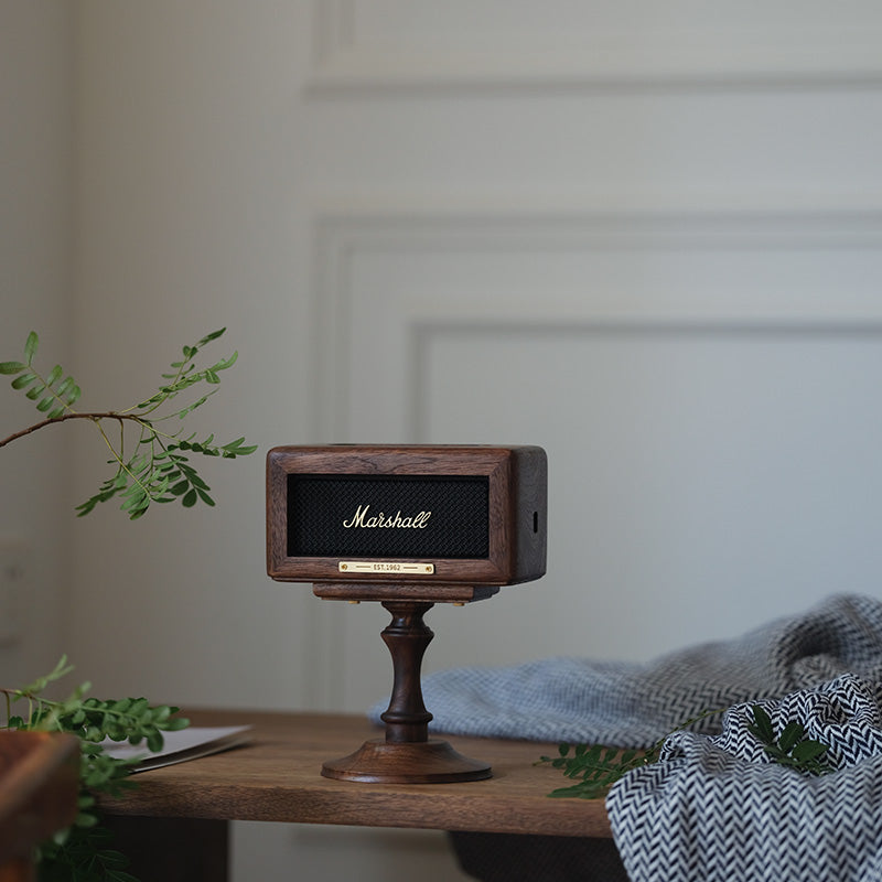 Minimalist walnut speaker base for desktop audio setup