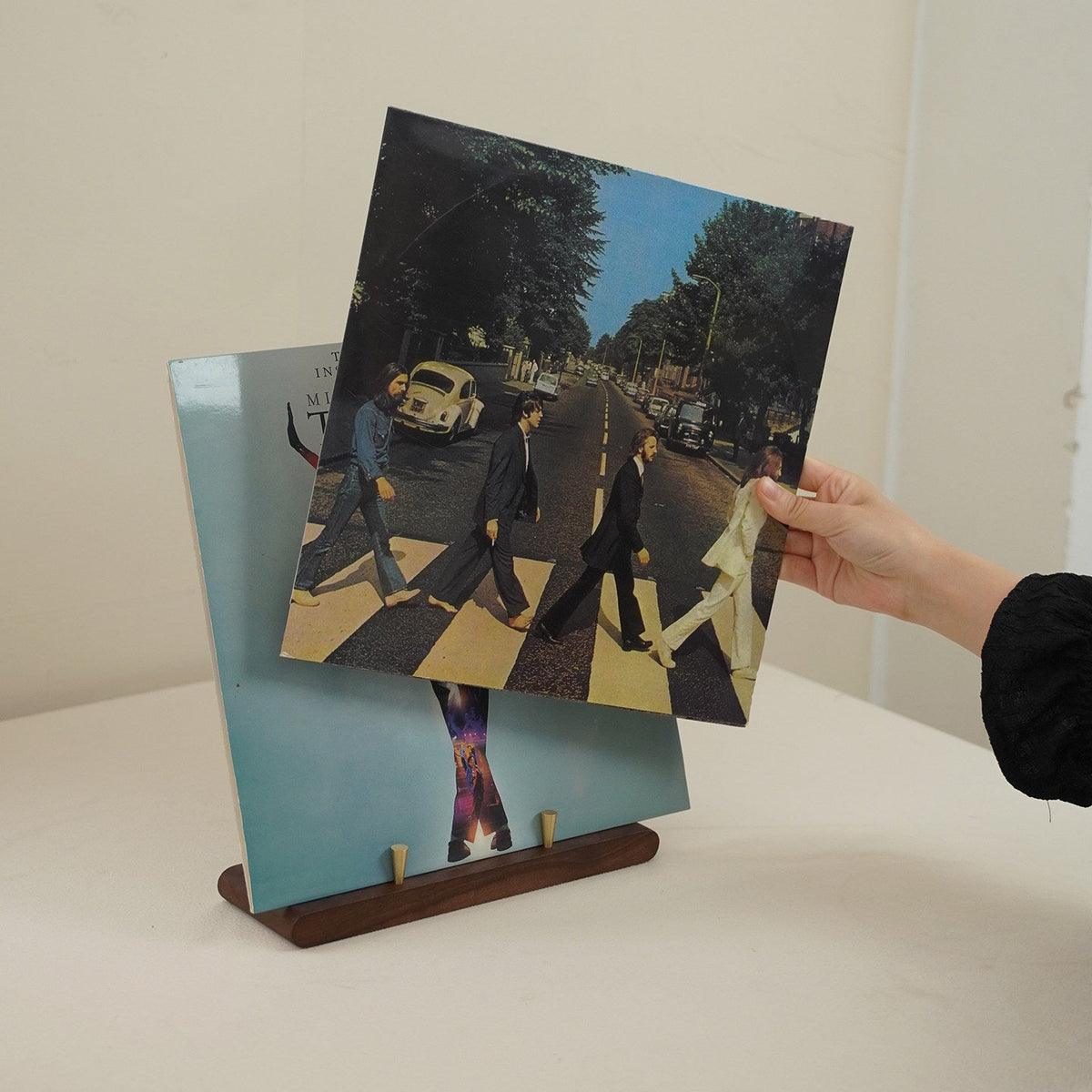 Minimalist wooden album holder for music collections