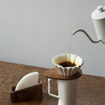Minimalist wooden coffee accessory for home brewing station