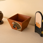 Natural wood basket with smooth grain finish and hand-painted details