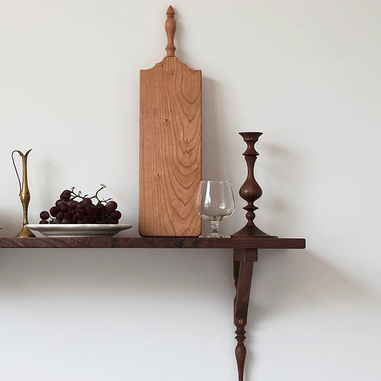 Natural wood candle stand with smooth walnut grain finish