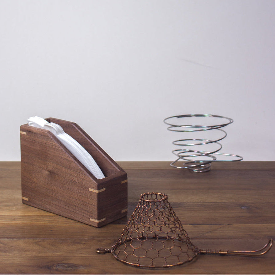 Natural wood coffee filter holder with smooth walnut grain finish