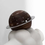 Natural wood globe calendar with smooth walnut grain finish