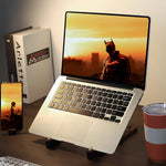 Natural wood laptop stand with smooth walnut grain finish