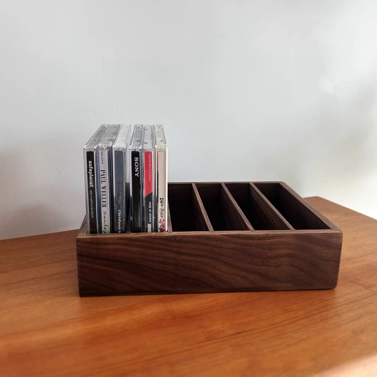 Natural wood media rack with smooth grain finish