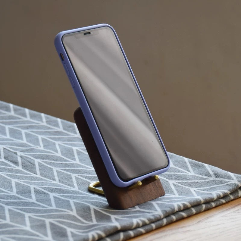 Natural wood phone holder with smooth walnut grain finish
