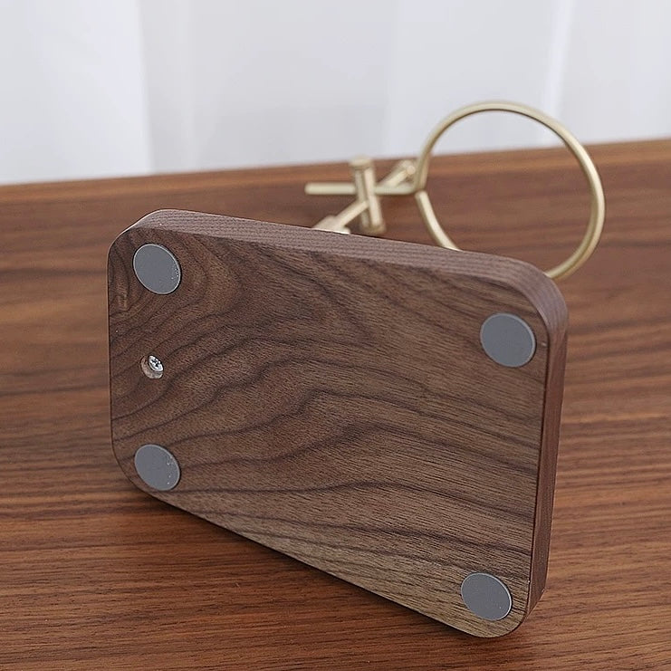 Natural wood pour-over coffee stand with smooth walnut grain finish