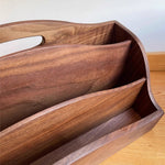 Natural wood record storage rack with smooth walnut grain finish