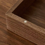 Natural wood storage box with smooth walnut grain finish