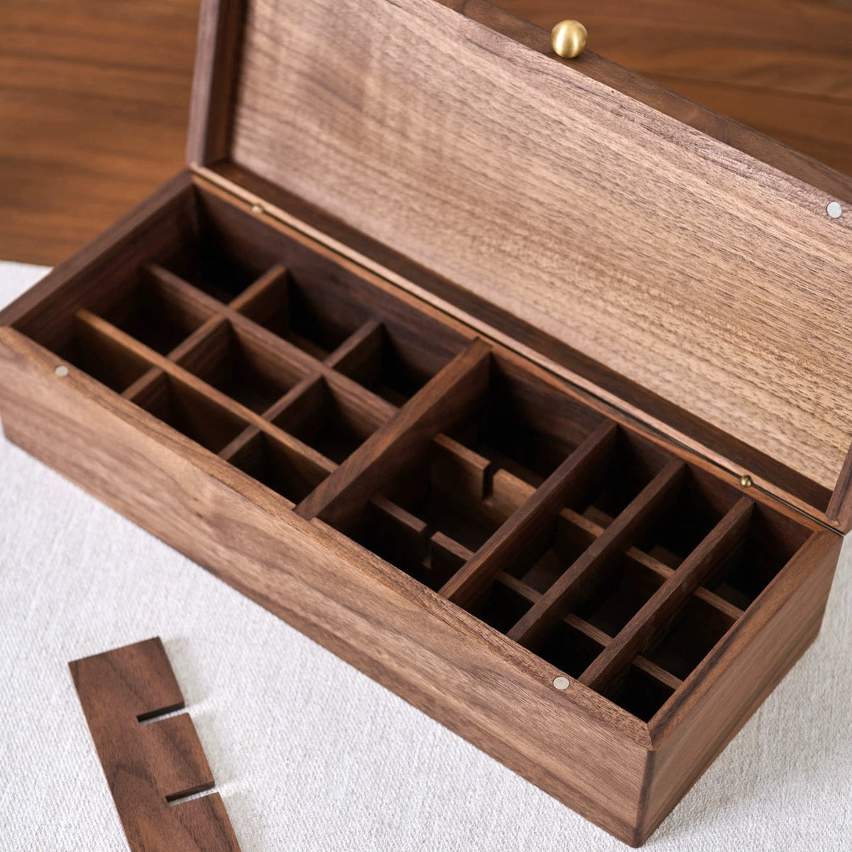 Natural wood storage box with smooth walnut grain finish