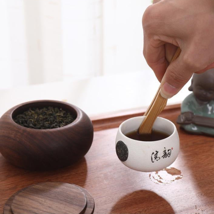 Natural wood tea canister with smooth walnut grain finish