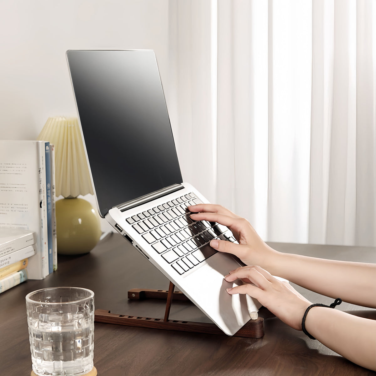 NoteLift wooden laptop stand made from natural walnut wood