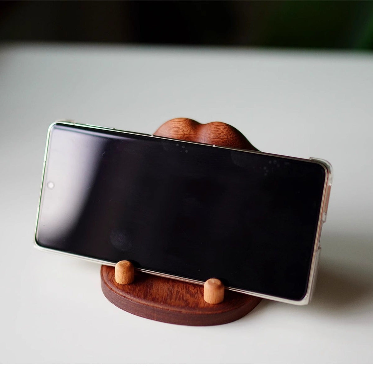 Pawprint wooden phone holder made from natural solid wood