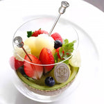 Premium walnut and metal fruit picks for serving treats