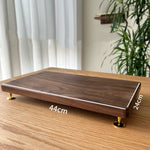 Minimalist walnut speaker base for desktop audio setup