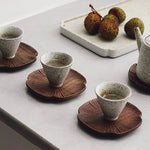 Set of 4 solid walnut coasters with elegant leaf shape