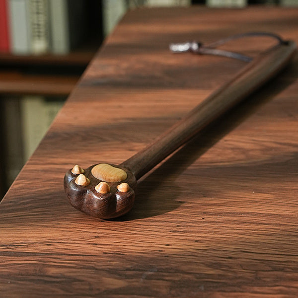Solid black walnut back scratcher with cat claw design