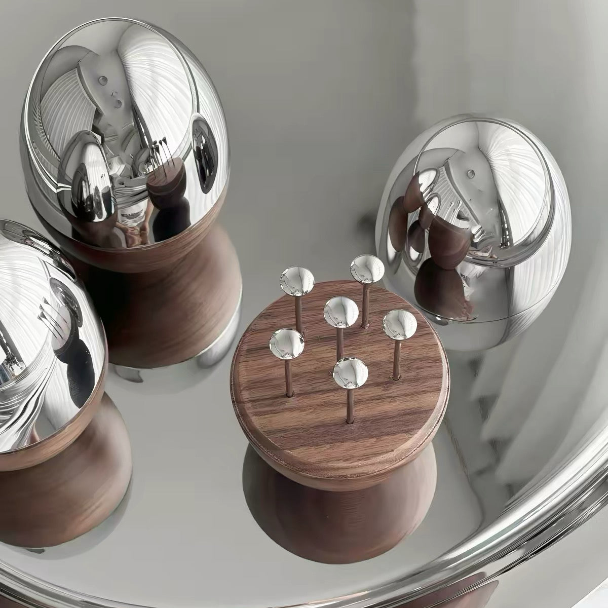 Solid walnut and stainless steel fruit pick set with oval design
