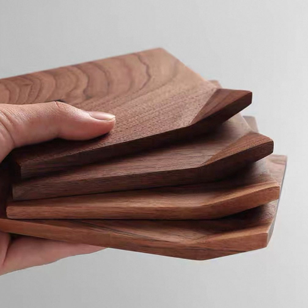 Solid walnut coaster set with unique rolled edge design