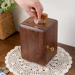 Solid walnut coin bank with minimalist design