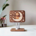 Solid walnut phone and tablet holder with rotating design