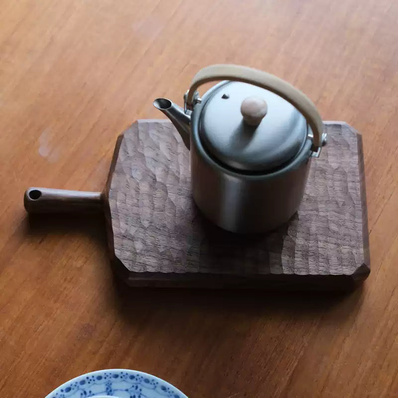 Solid walnut serving board made from natural wood grain