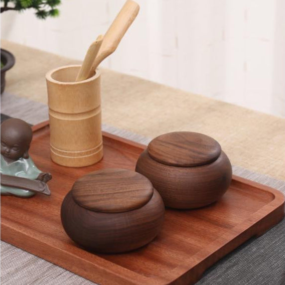 Solid walnut tea canister with leaf design