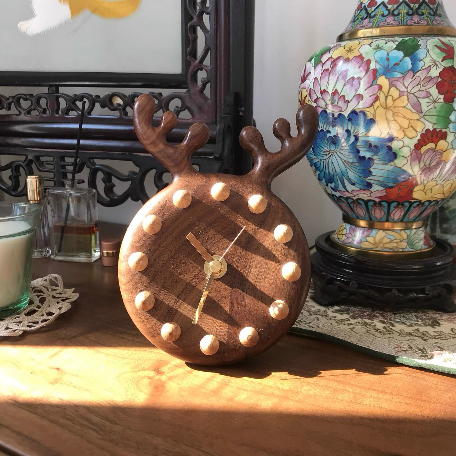 Solid walnut wall clock with forest inspired design