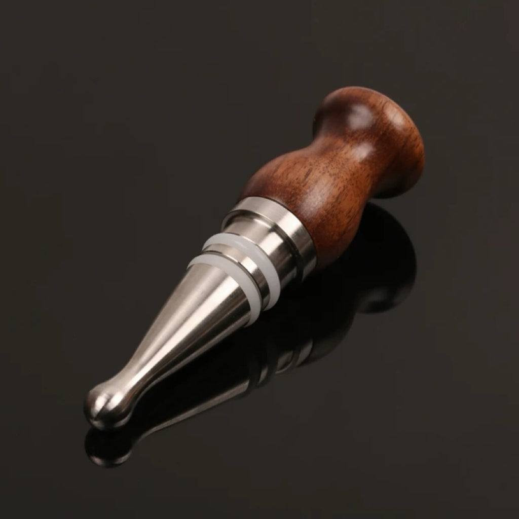 Solid walnut wine stopper with minimalist design