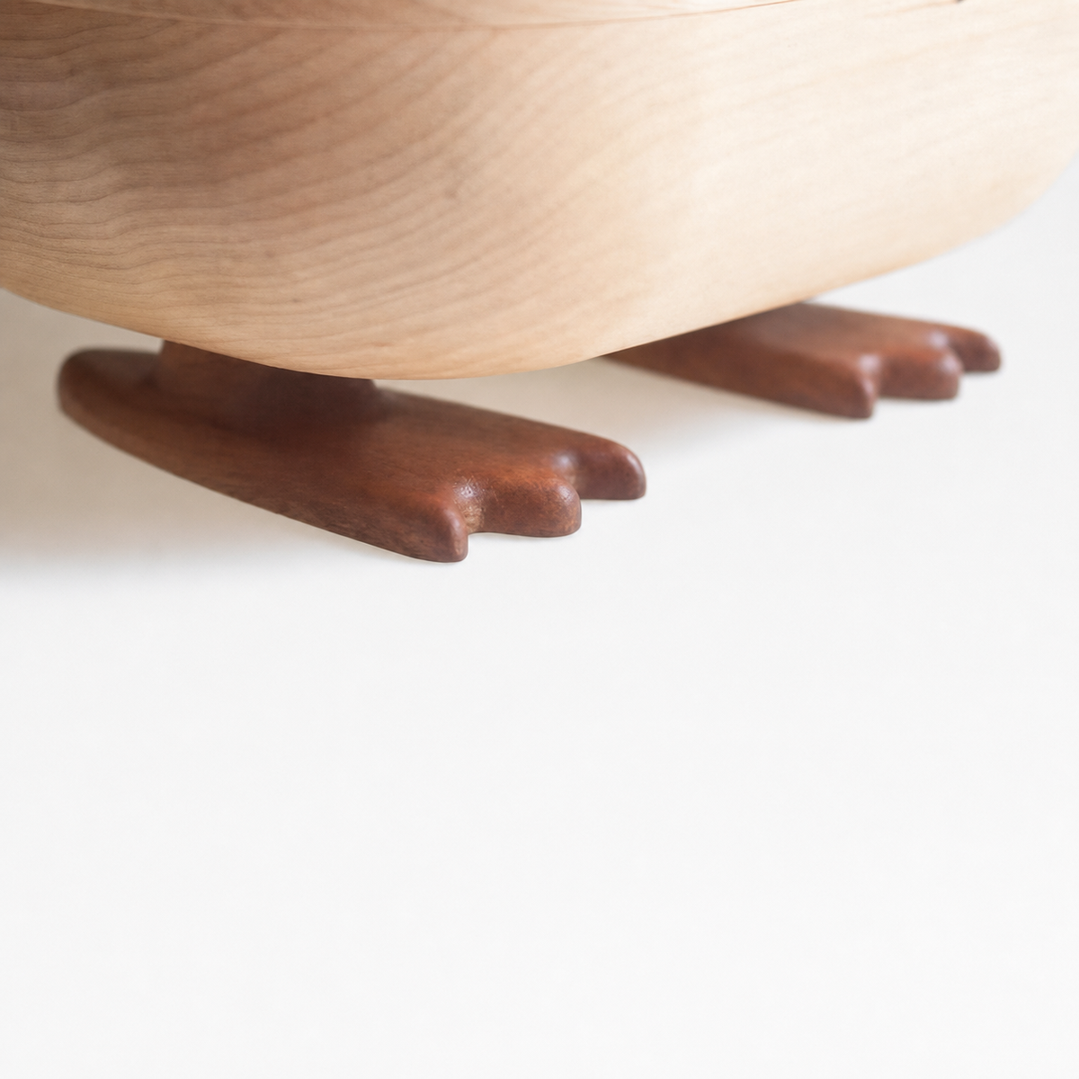 Solid wood tissue holder with cute duck inspired shape