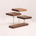 Three-tier wooden side table with a modern floating design, featuring dark brown wood shelves and brass metal support rods, set against a plain off-white background.