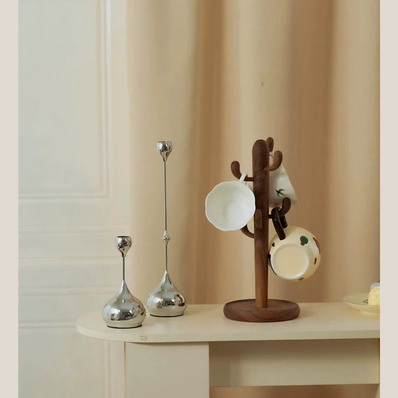Solid walnut cup holder with desert tree design